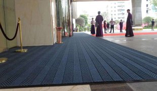 Matrix designed logo mat